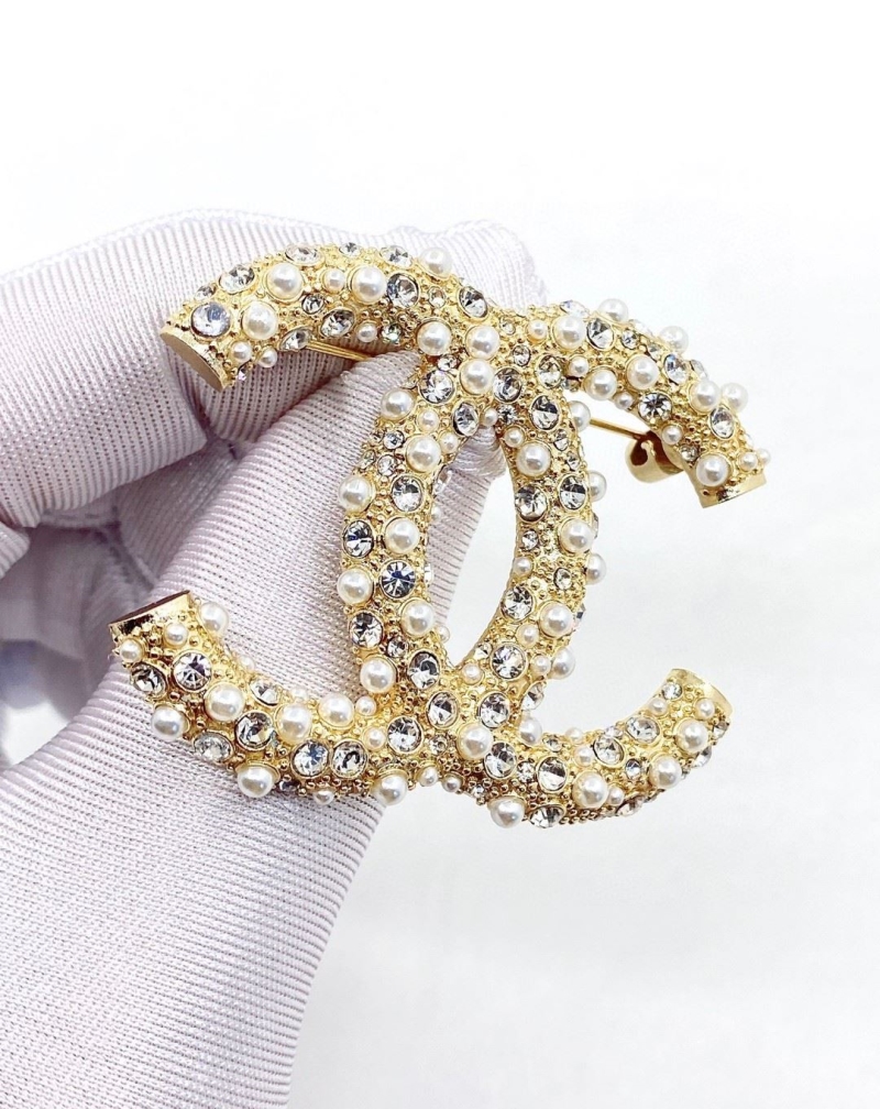 Ch**el brooches